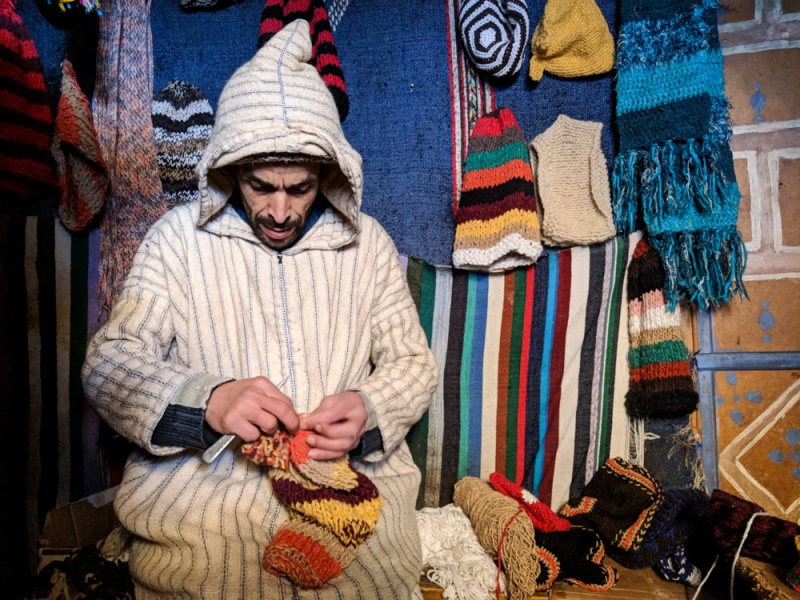 Mohammad (AKA “Hat Man”) making hats!